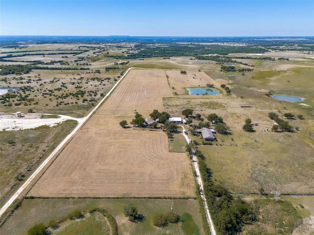 25 Acres of Agricultural Land with Home for Sale in Godley, Texas