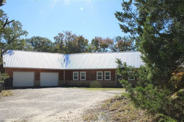 1.72 Acres of Residential Land with Home for Sale in Quinlan, Texas