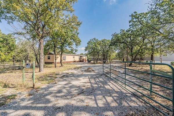 3 Acres of Residential Land with Home for Sale in Millsap, Texas