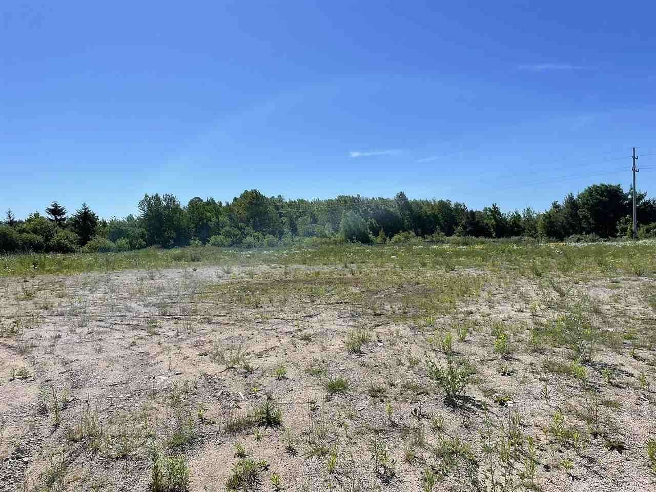 5.2 Acres of Commercial Land for Sale in Charlevoix, Michigan