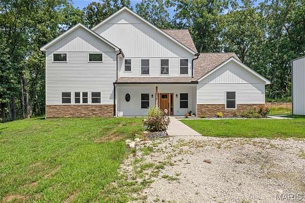 14.9 Acres of Recreational Land with Home for Sale in Hawk Point, Missouri