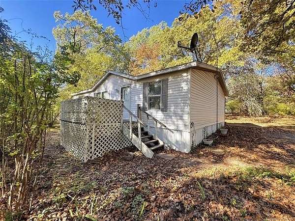 2.5 Acres of Residential Land with Home for Sale in Tahlequah, Oklahoma