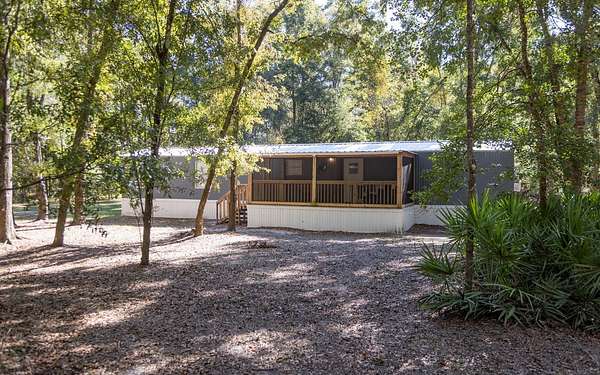 5 Acres of Residential Land with Home for Sale in Branford, Florida