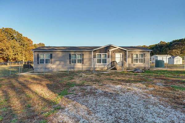 16.3 Acres of Land with Home for Sale in Springfield, Missouri