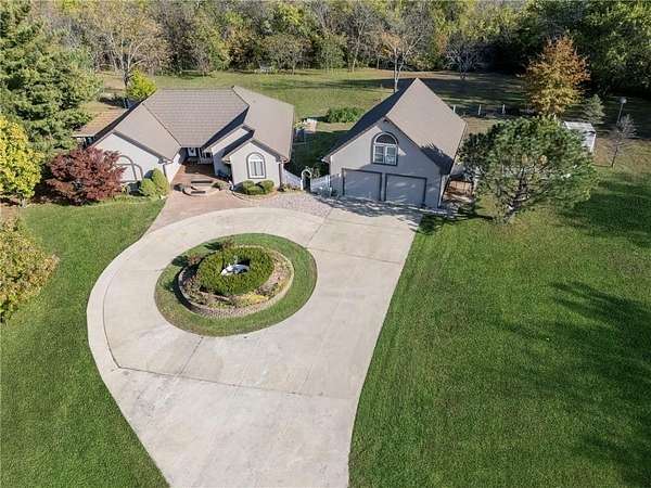 10.2 Acres of Land with Home for Sale in Oak Grove, Missouri