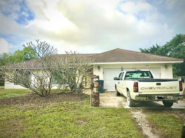 1.52 Acres of Land with Home for Sale in Loxahatchee Groves, Florida