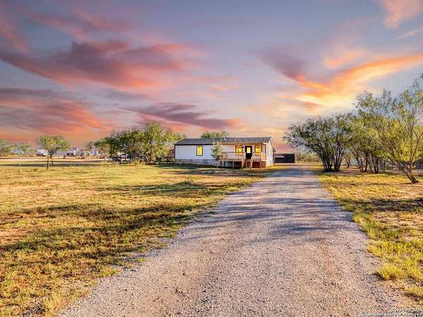 6.29 Acres of Residential Land with Home for Sale in Adkins, Texas