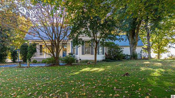 1.67 Acres of Land with Home for Sale in Arlington, Kentucky