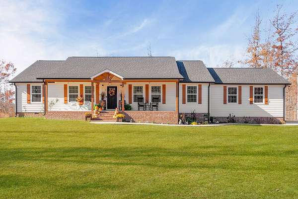 8.36 Acres of Residential Land with Home for Sale in Erin, Tennessee