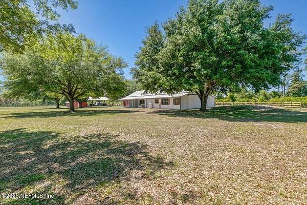 5.58 Acres of Land with Home for Sale in San Mateo, Florida