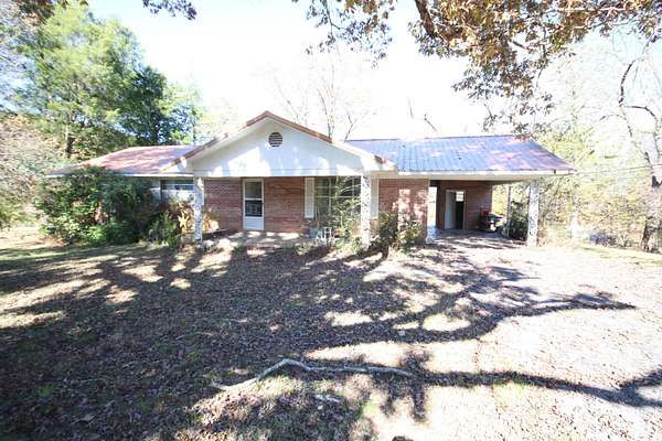 1.6 Acres of Residential Land with Home for Sale in Tellico Plains, Tennessee