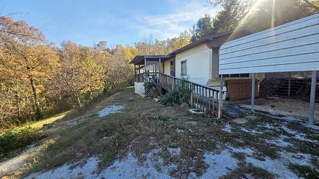 3.3 Acres of Land with Home for Sale in Marble Falls Township, Arkansas
