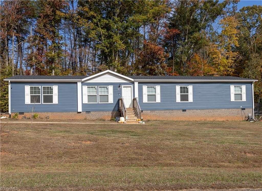 4.31 Acres of Land with Home for Sale in Sandy Ridge, North Carolina