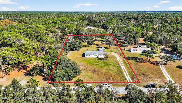 2 Acres of Residential Land with Home for Sale in Homosassa, Florida