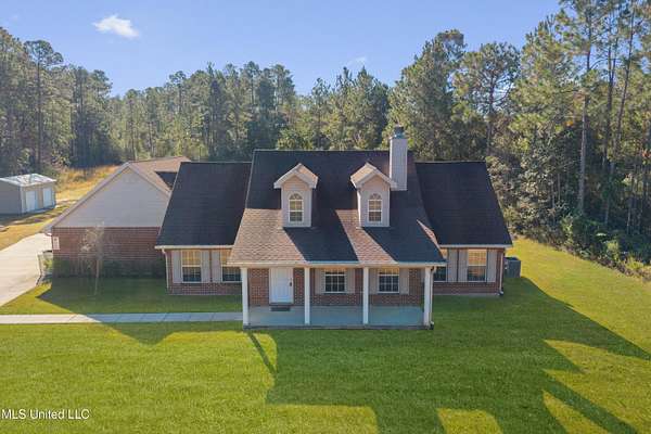 5.6 Acres of Residential Land with Home for Sale in Pass Christian, Mississippi