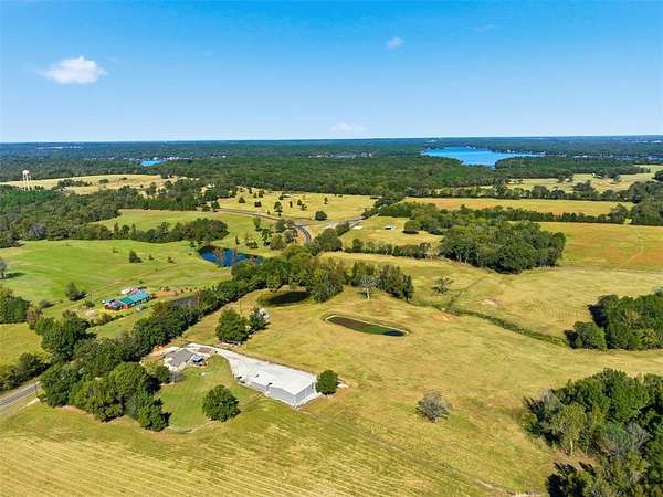 92.4 Acres of Land with Home for Sale in Scroggins, Texas