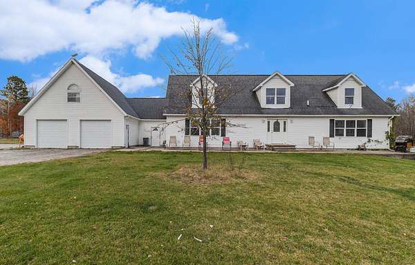 7.5 Acres of Residential Land with Home for Sale in Scottville, Michigan