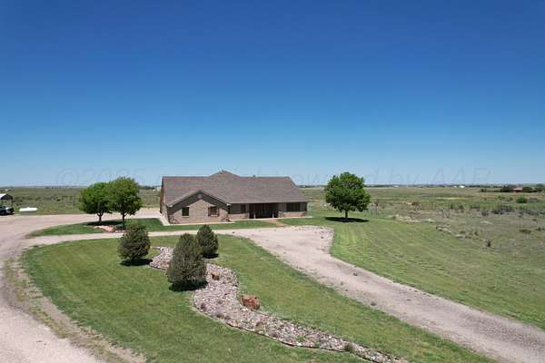 63.3 Acres of Agricultural Land with Home for Sale in Canyon, Texas