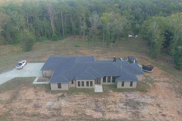 18.9 Acres of Recreational Land with Home for Sale in Atlanta, Texas