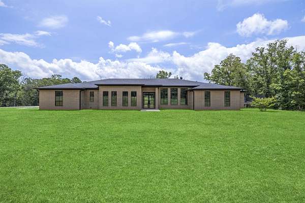 18.9 Acres of Recreational Land with Home for Sale in Atlanta, Texas