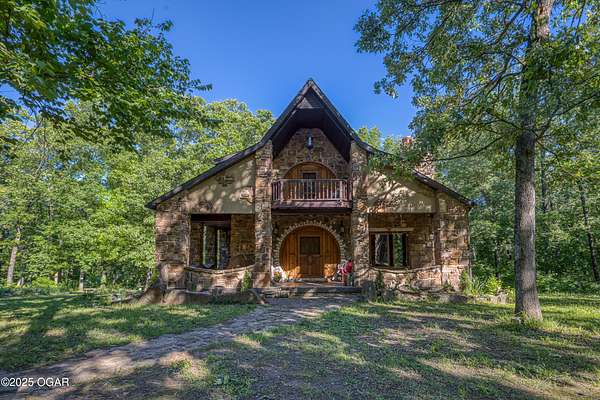 125 Acres of Agricultural Land with Home for Sale in Carthage, Missouri