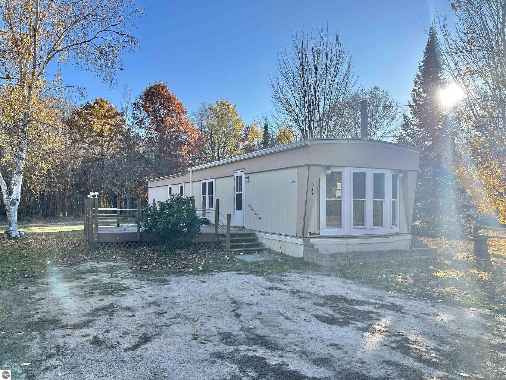 2.2 Acres of Residential Land with Home for Sale in Kalkaska, Michigan