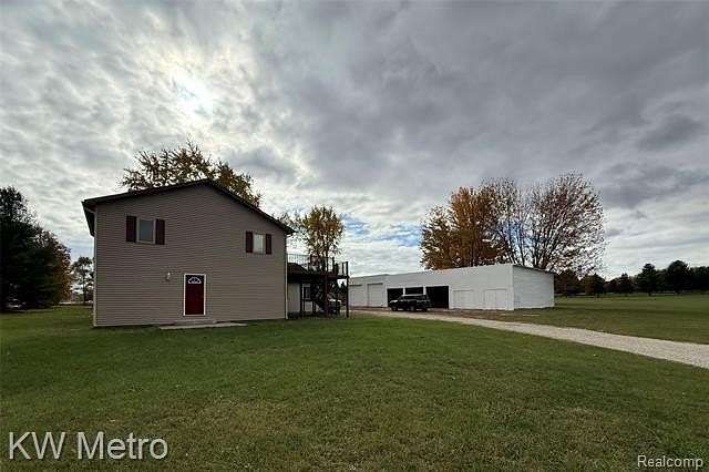 3 Acres of Improved Mixed-Use Land for Sale in Weidman, Michigan