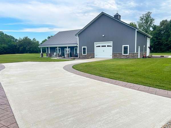 14.7 Acres of Recreational Land with Home for Sale in Dexter, Missouri