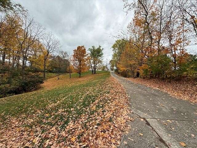 2.67 Acres of Residential Land with Home for Sale in Latonia, Kentucky