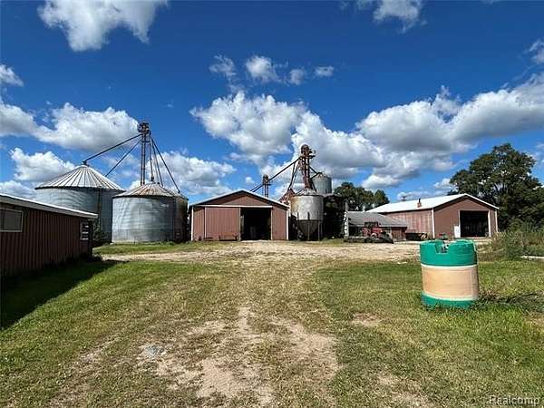 81.3 Acres of Agricultural Land with Home for Sale in Allenton, Michigan