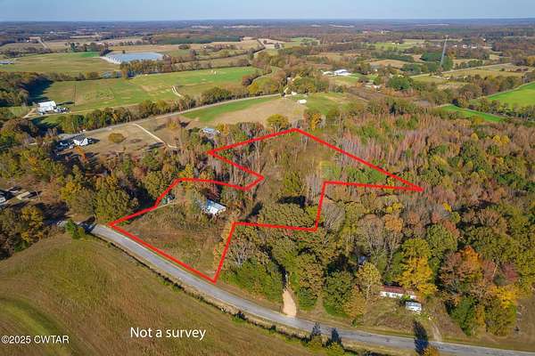 6.88 Acres of Residential Land with Home for Sale in Cedar Grove, Tennessee