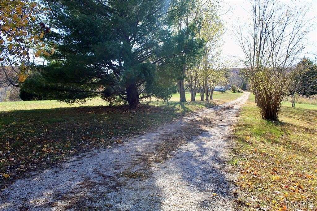 7.1 Acres of Land with Home for Sale in Marble Hill, Missouri