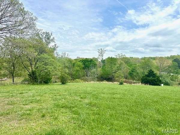 7.1 Acres of Land with Home for Sale in Marble Hill, Missouri