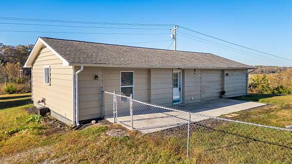 1.9 Acres of Land with Home for Sale in Oldfort, Tennessee