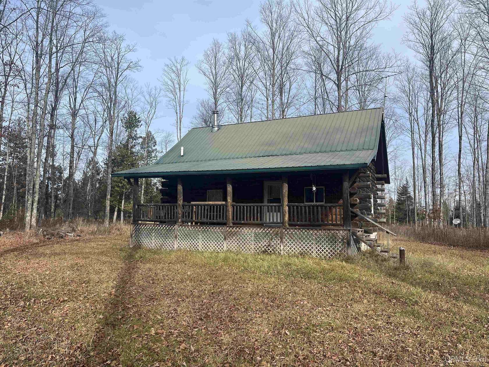 120 Acres of Recreational Land with Home for Sale in Cornell, Michigan