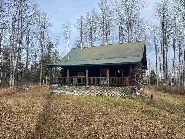120 Acres of Recreational Land with Home for Sale in Cornell, Michigan