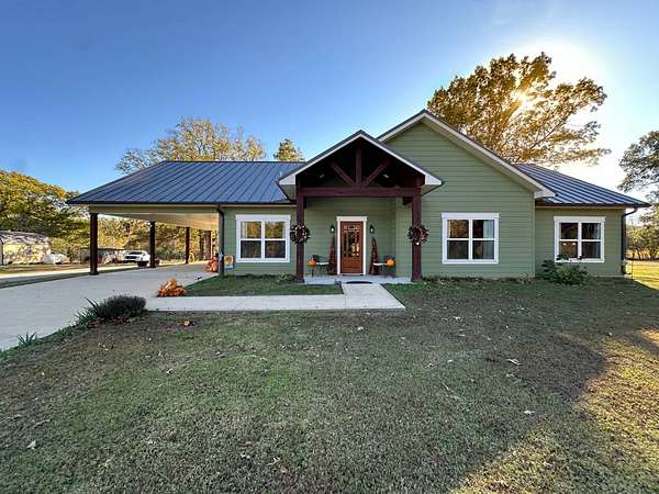 5 Acres of Residential Land with Home for Sale in Strawberry, Arkansas