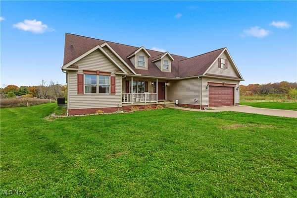 10.7 Acres of Land with Home for Sale in Dellroy, Ohio