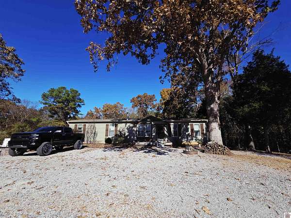 5.23 Acres of Residential Land with Home for Sale in Benton, Kentucky