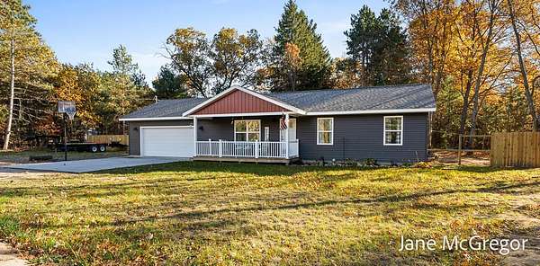 2 Acres of Residential Land with Home for Sale in Twin Lake, Michigan