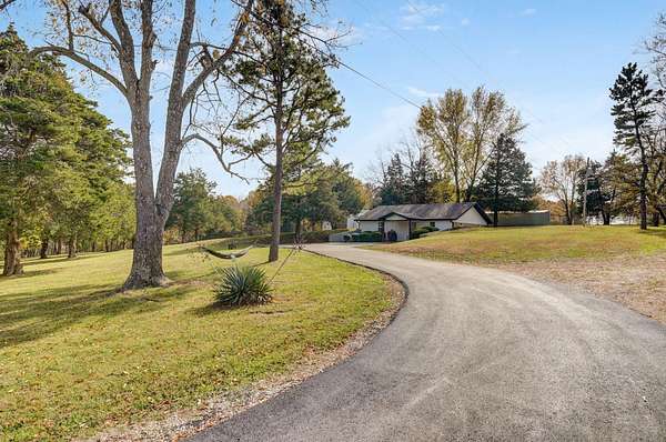 14.5 Acres of Land with Home for Sale in Rogersville, Missouri