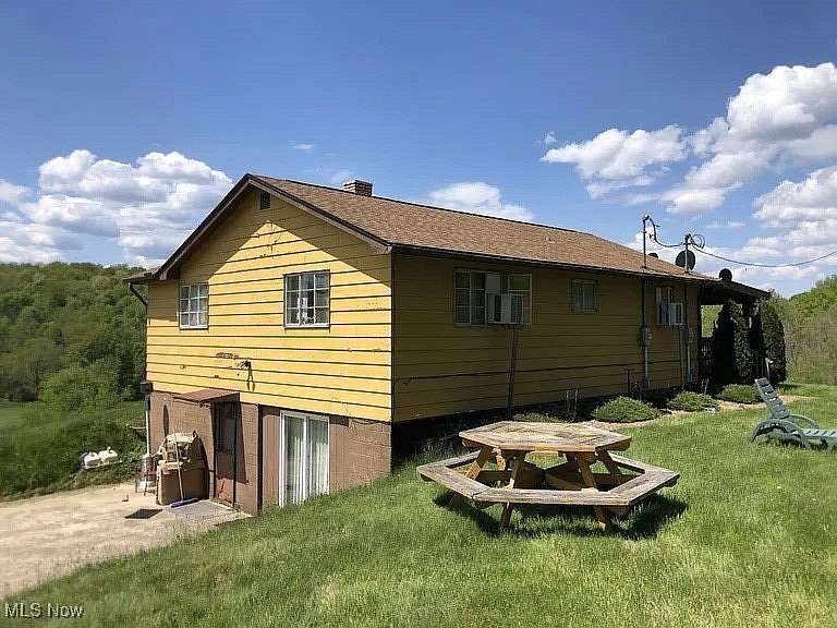 9.5 Acres of Residential Land with Home for Sale in Warsaw, Ohio