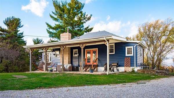 9.36 Acres of Land with Home for Sale in Blue Rock, Ohio
