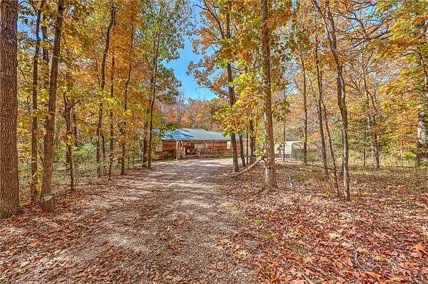 2.49 Acres of Residential Land with Home for Sale in Seligman, Missouri