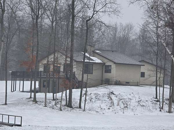 17 Acres of Recreational Land with Home for Sale in Sand Lake, Michigan