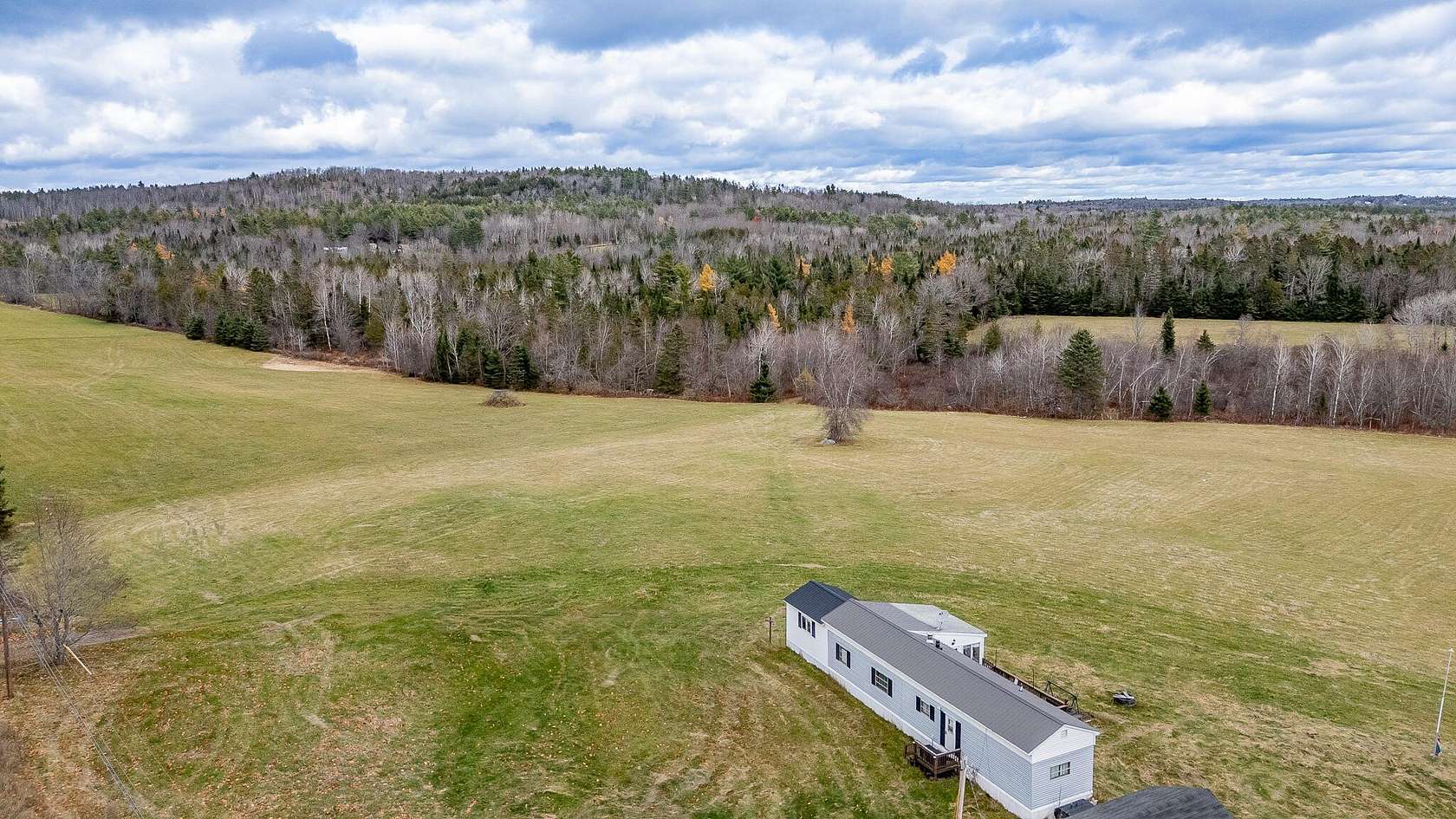 37 Acres of Land with Home for Sale in Sangerville, Maine