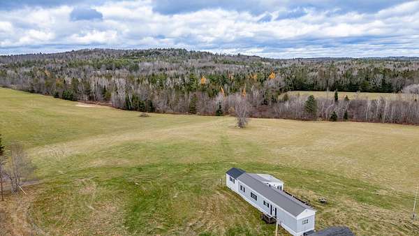 37 Acres of Land with Home for Sale in Sangerville, Maine
