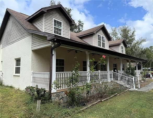 4.7 Acres of Land with Home for Sale in Brooksville, Florida