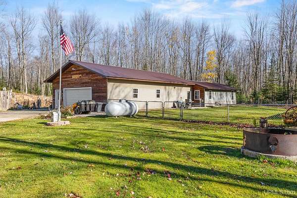 77 Acres of Recreational Land with Home for Sale in Menominee, Michigan
