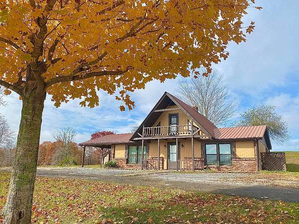 21 Acres of Land with Home for Sale in Columbia, Kentucky